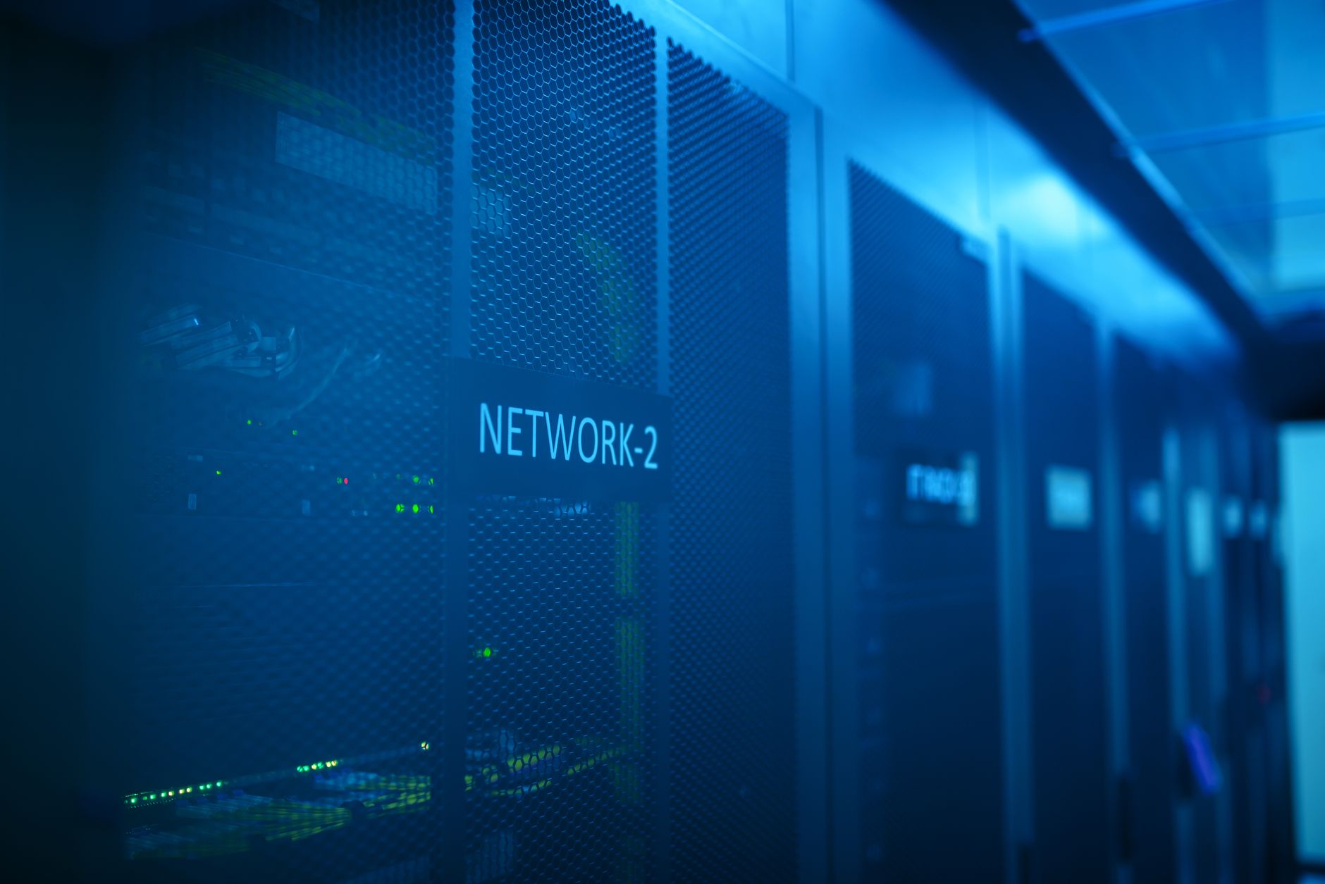 Data center server racks representing AI infrastructure investment and computing capacity