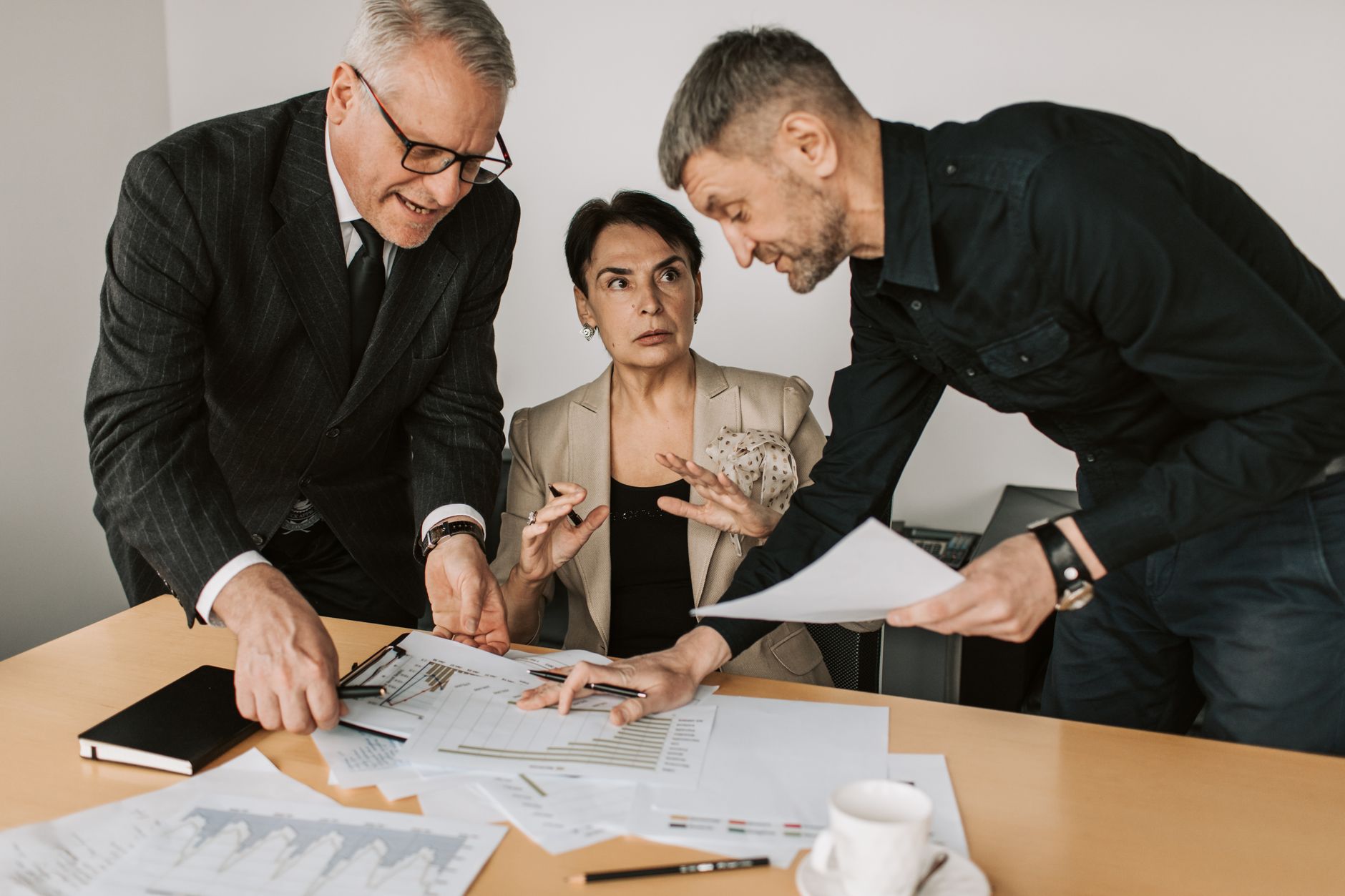 Business professionals in a meeting discussing enterprise software strategy