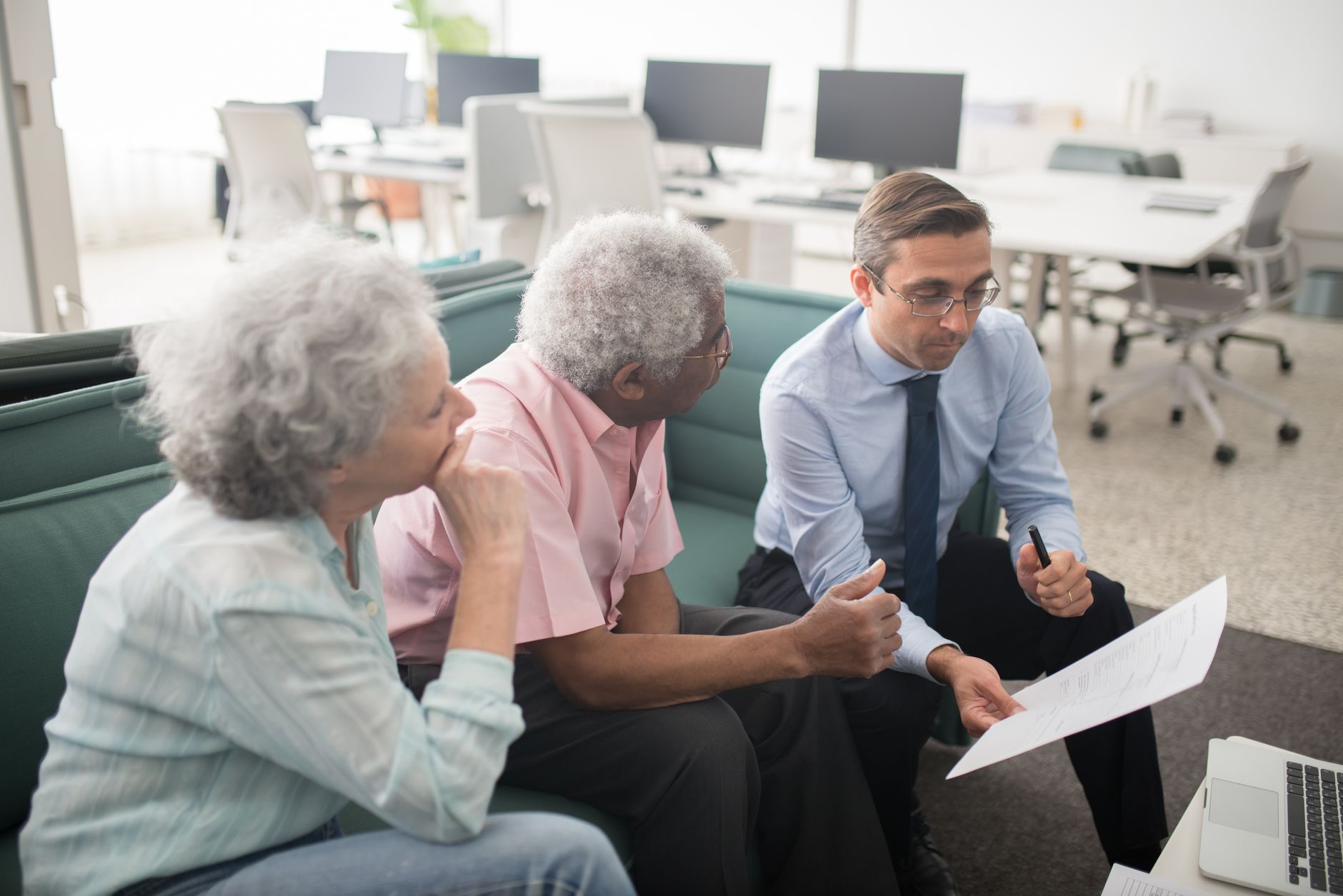 Financial advisor meeting with a client to discuss wealth management strategy