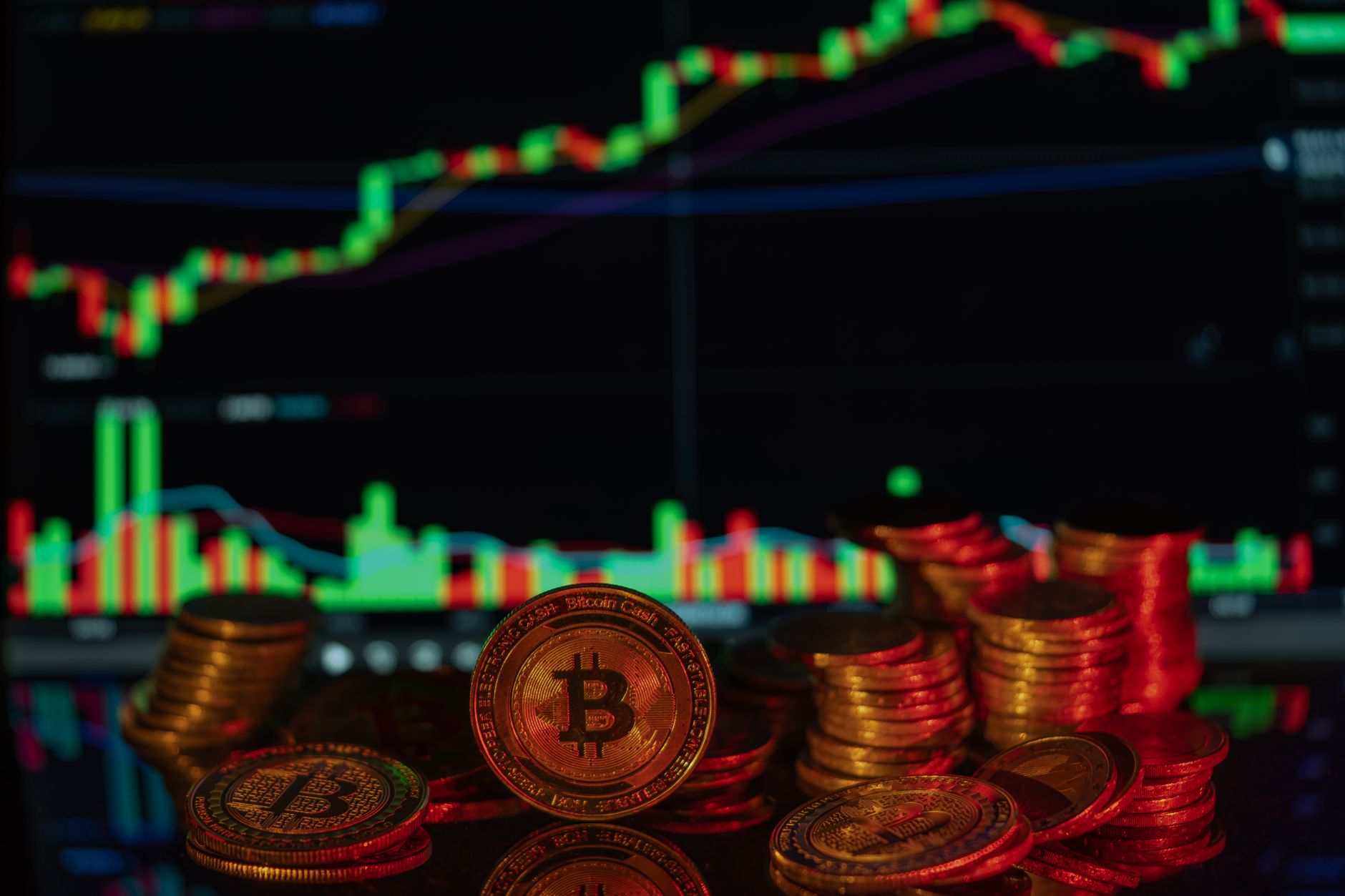 Gold and silver cryptocurrency coins representing digital asset markets