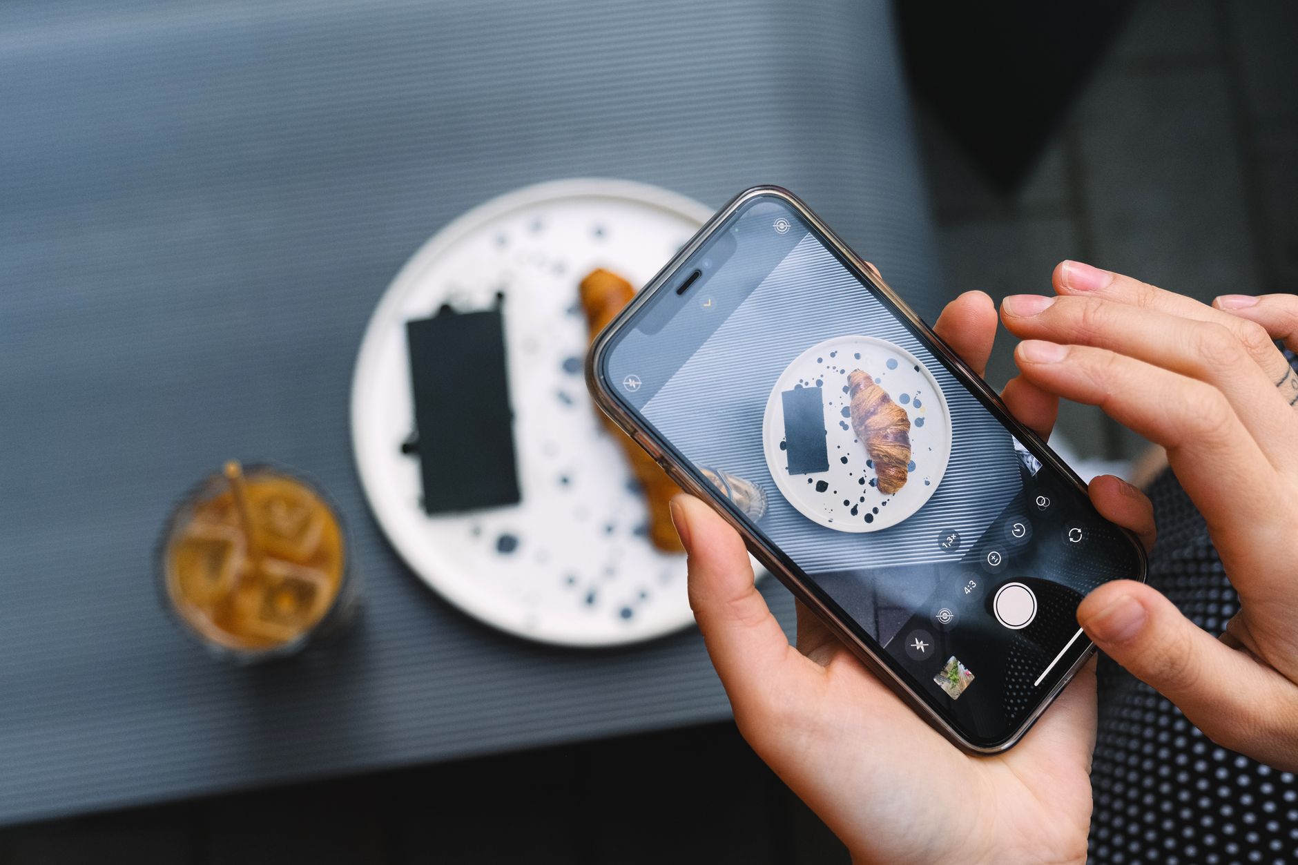 Person using a food delivery app on a smartphone to order groceries