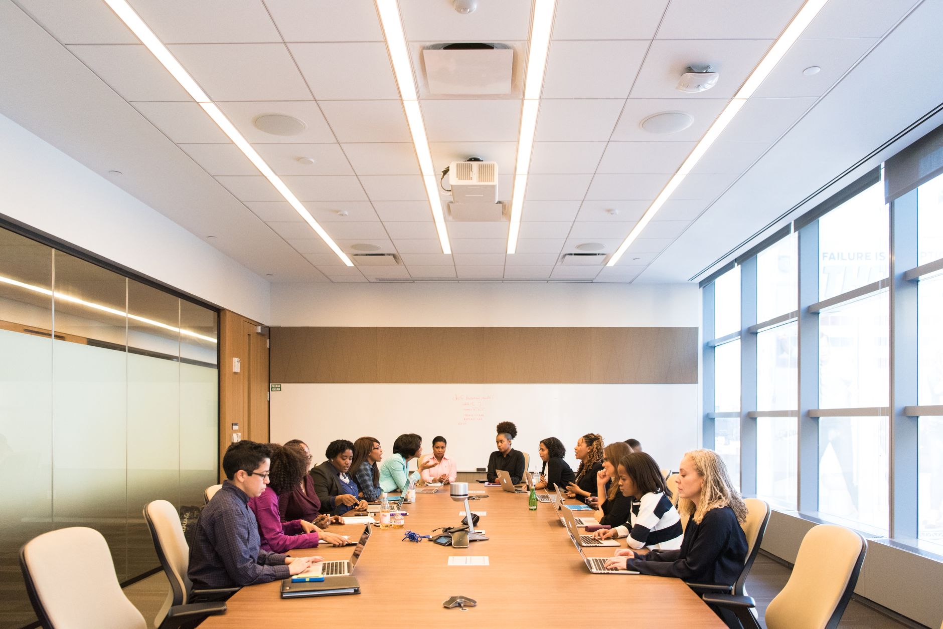 Business professionals reviewing technology strategy in a corporate meeting room