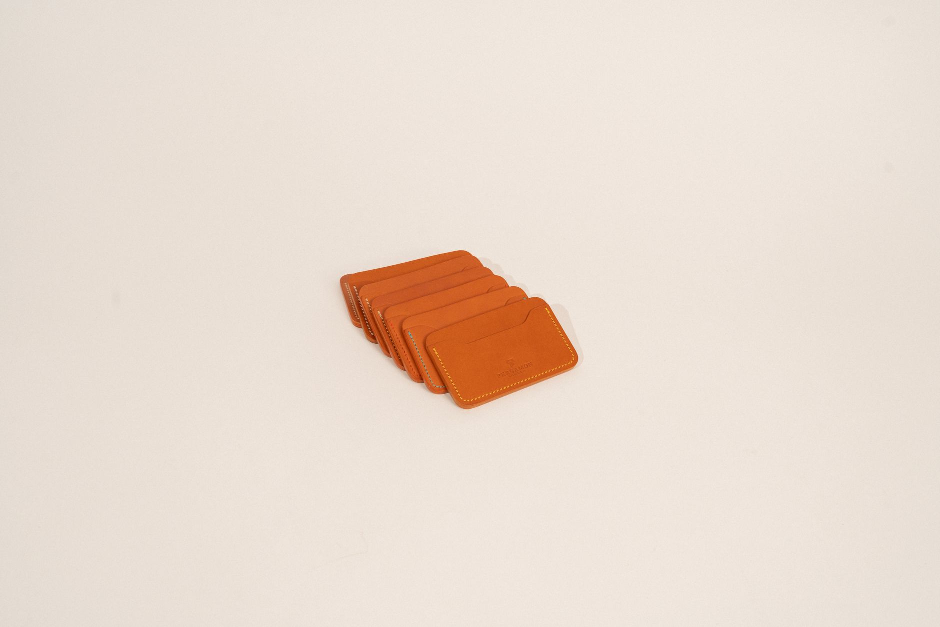 Close-up of a membership card being held near a wallet