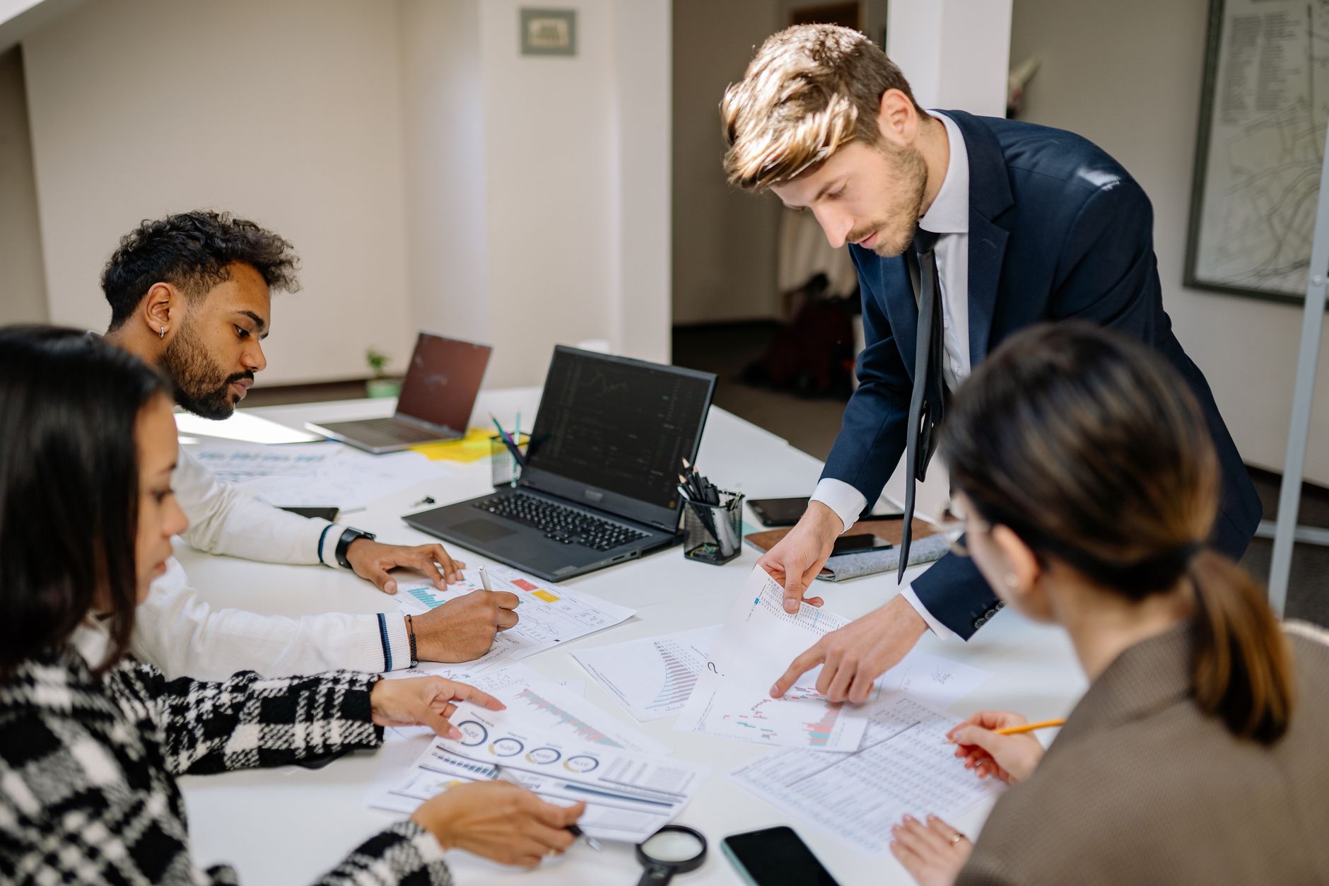Business professionals in a meeting discussing financial strategy and investment decisions