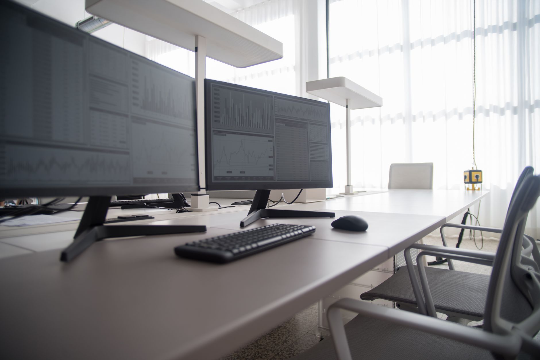 Business professionals reviewing cloud computing infrastructure in an office setting