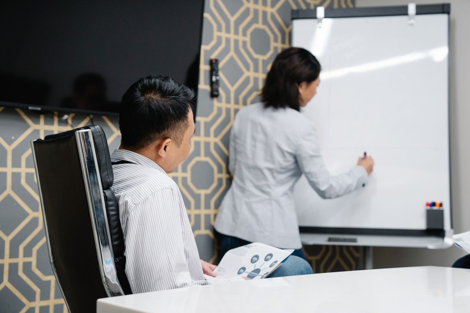 Business professionals in a meeting discussing international expansion strategy