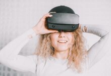 Person wearing a virtual reality headset in a modern indoor setting
