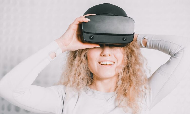 Person wearing a virtual reality headset in a modern indoor setting