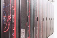 Rows of servers inside a modern enterprise data center facility