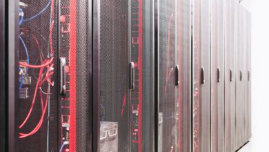 Rows of servers inside a modern enterprise data center facility