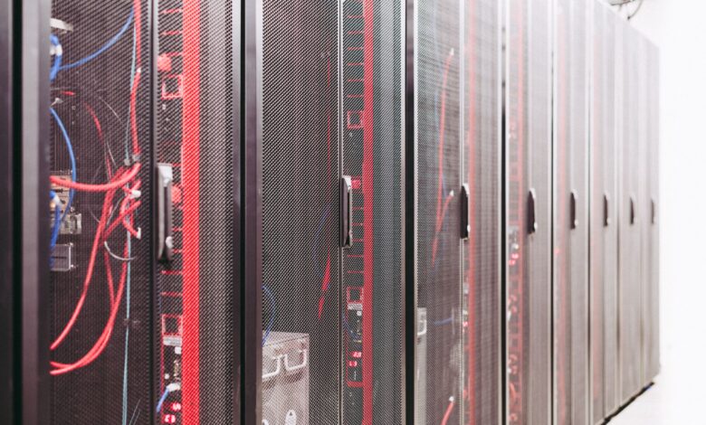 Rows of servers inside a modern enterprise data center facility