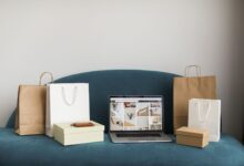 Stacked shipping boxes representing cross-border e-commerce deliveries affected by U.S. tariff changes