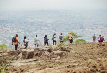 Small group of travelers participating in a local cultural activity