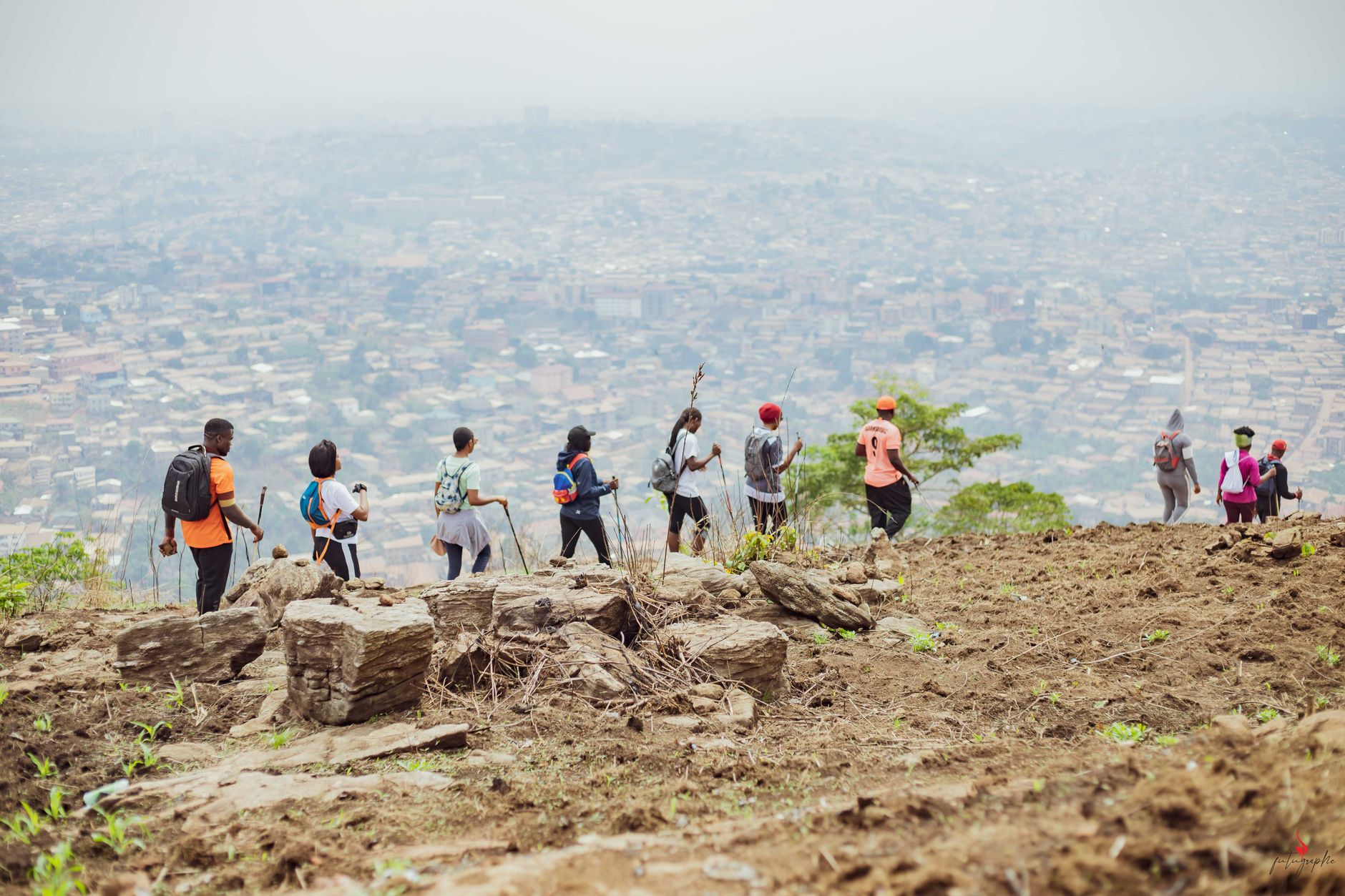 Small group of travelers participating in a local cultural activity
