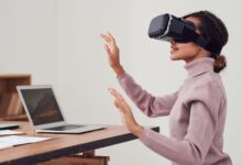 Person wearing a VR headset in a modern office environment