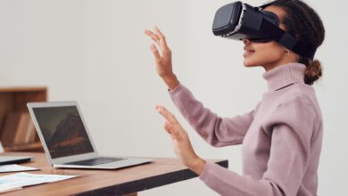 Person wearing a VR headset in a modern office environment