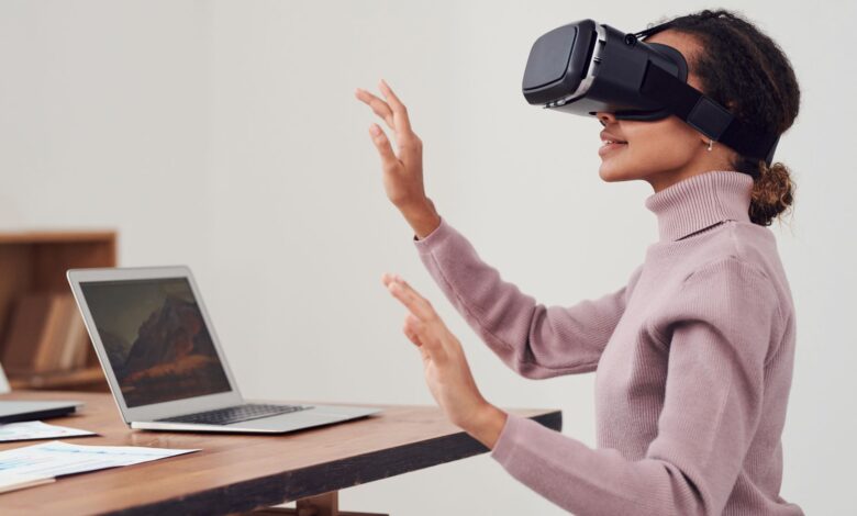 Person wearing a VR headset in a modern office environment