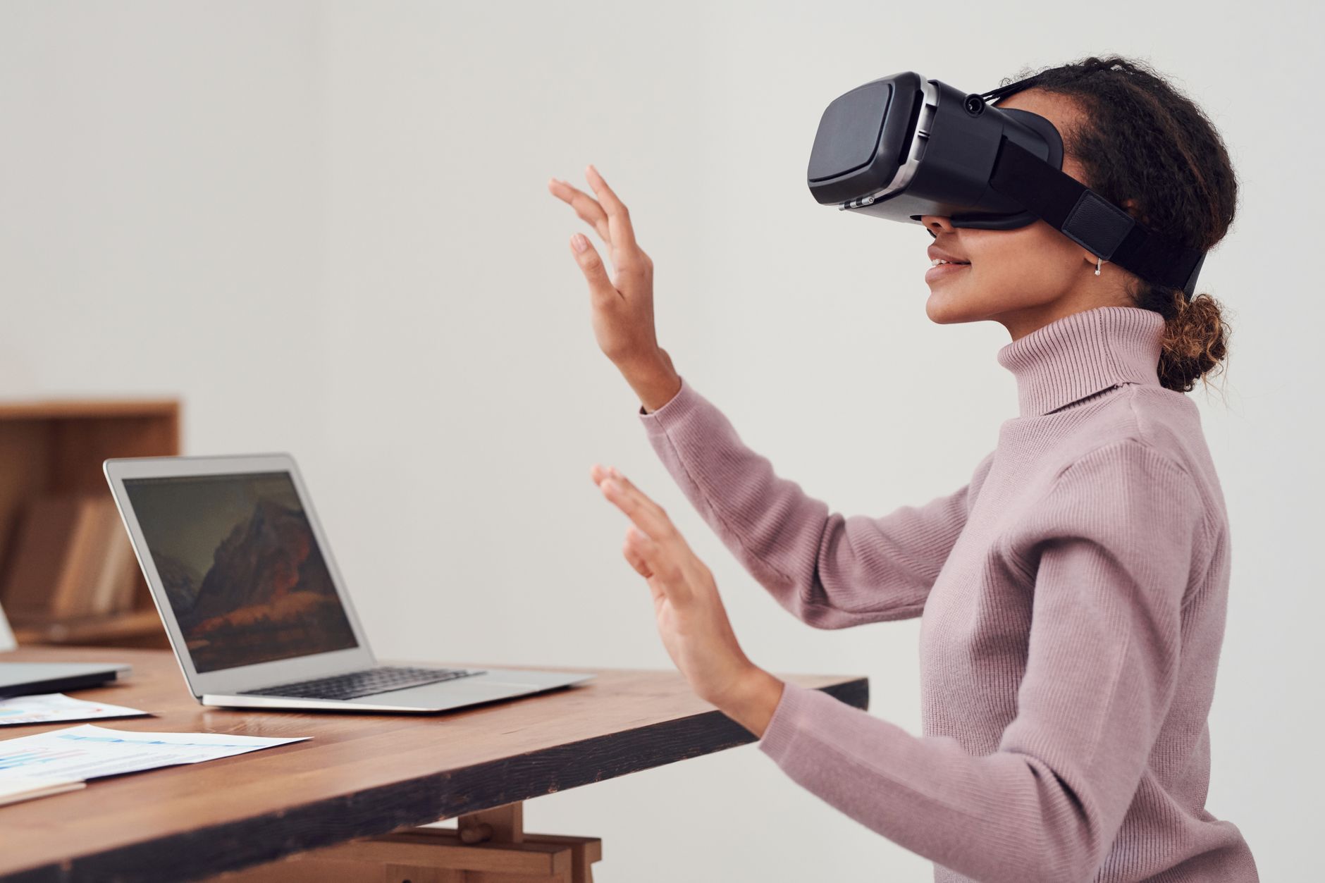 Person wearing a VR headset in a modern office environment