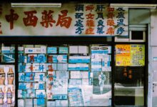 Digital advertising display inside a large retail store showing promotional content