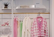 Interior of a modern fast-fashion clothing store with racks of garments
