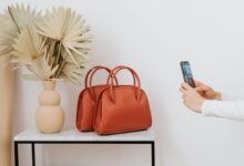 Close-up of an elegant leather luxury handbag on a neutral background