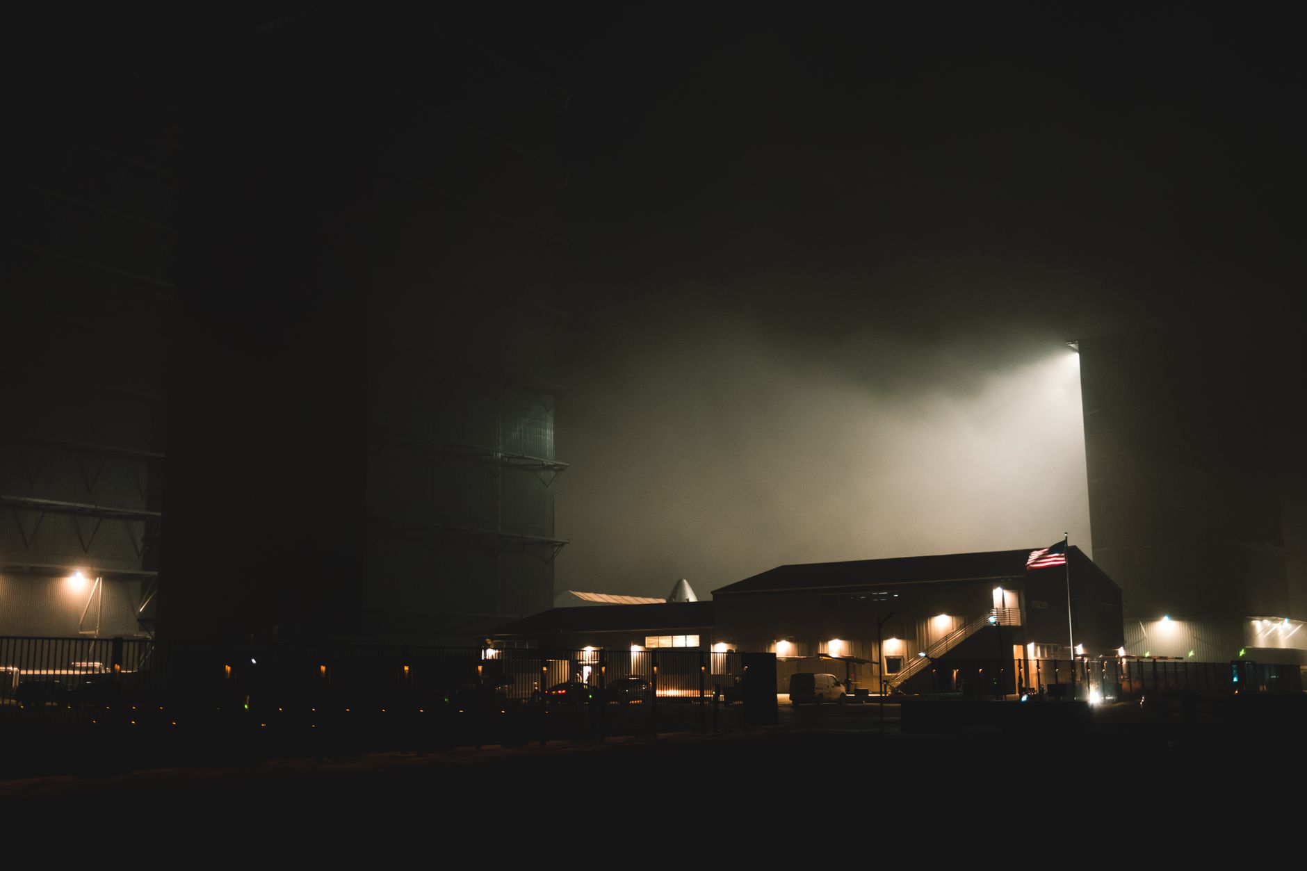 Rocket launching into night sky representing commercial satellite deployment missions