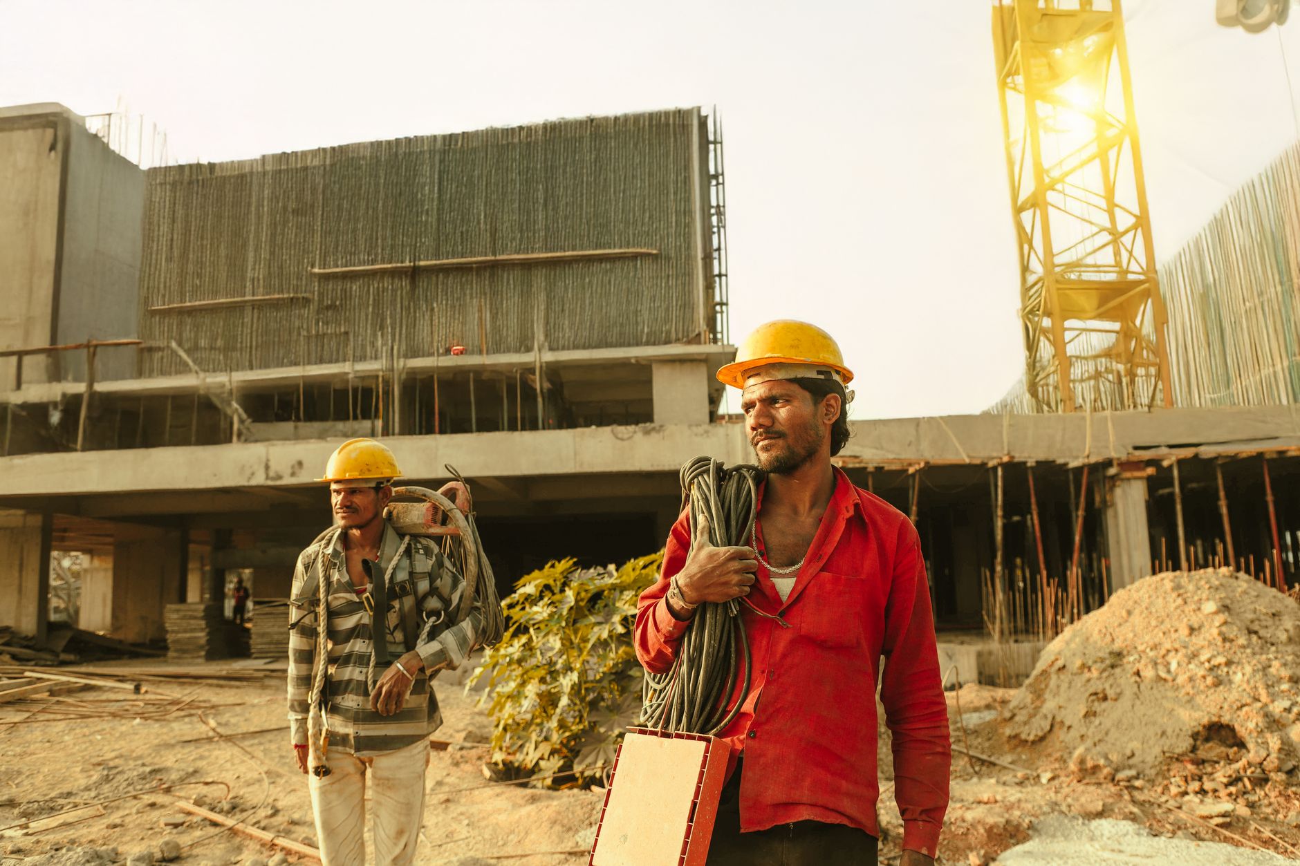 Workers in an Indian industrial facility working on a production floor