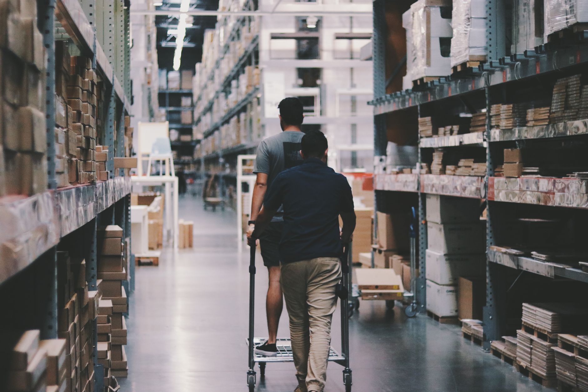 Large warehouse interior showing domestic fulfillment operations for e-commerce platforms