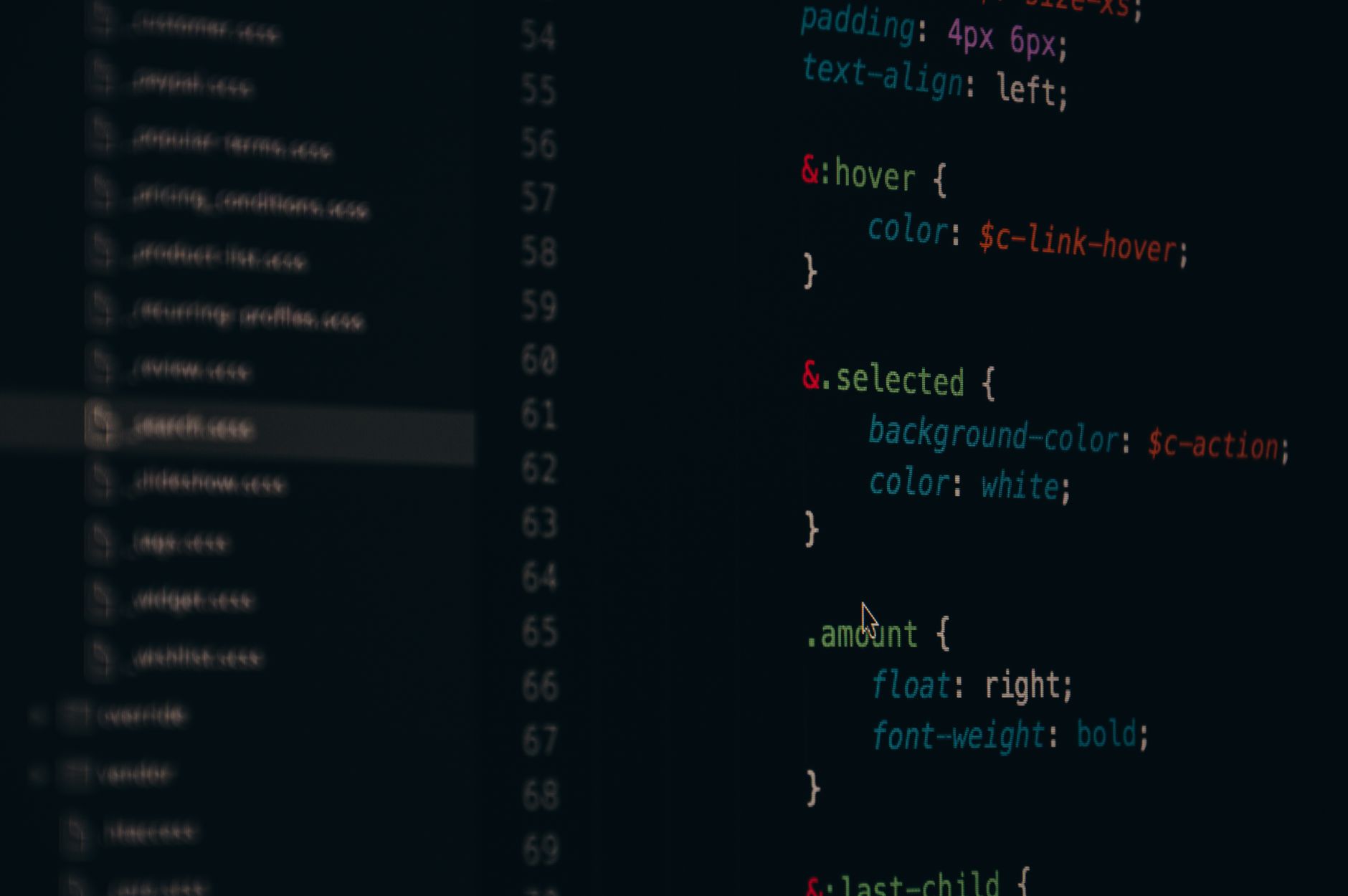 Developer working at a computer screen representing AI model development and product engineering