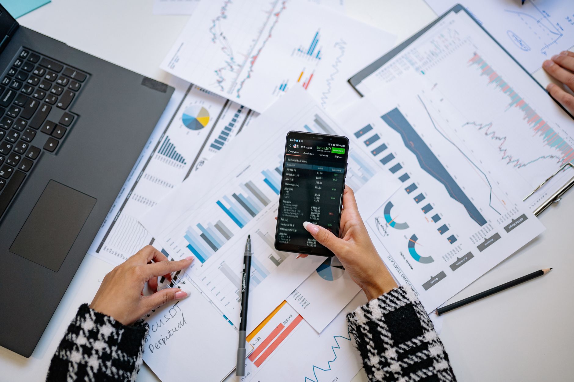 Professional reviewing data on a screen in a corporate technology environment
