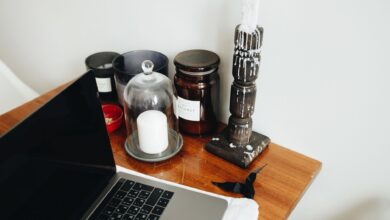 A modern workspace with a laptop open on a desk, representing digital productivity tools