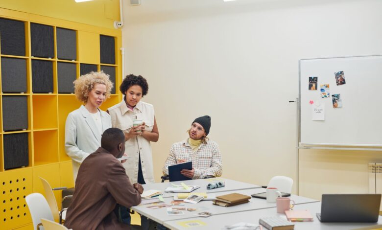 HR team discussing workforce management software at a conference table
