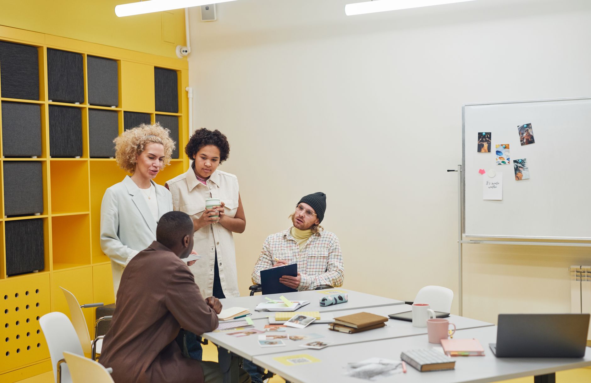 HR team discussing workforce management software at a conference table