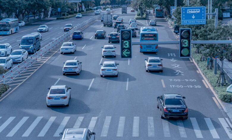 A self-driving electric vehicle navigating a city street without a driver