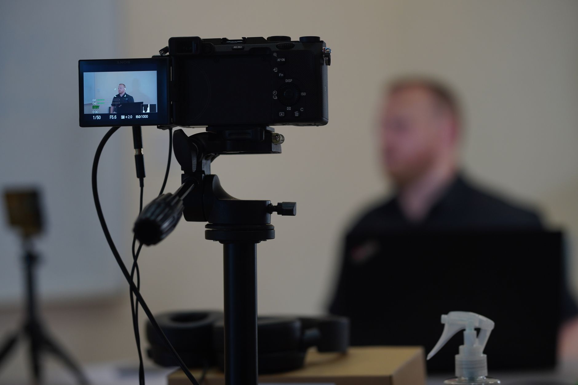 Content creator filming a product review video for social media commerce
