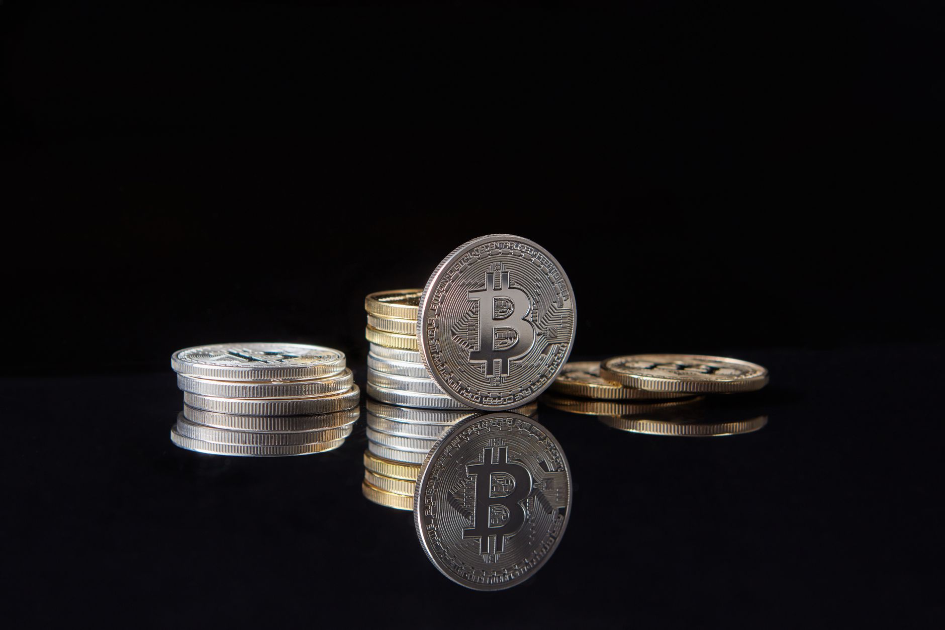 Digital financial charts and currency icons representing stablecoin market competition