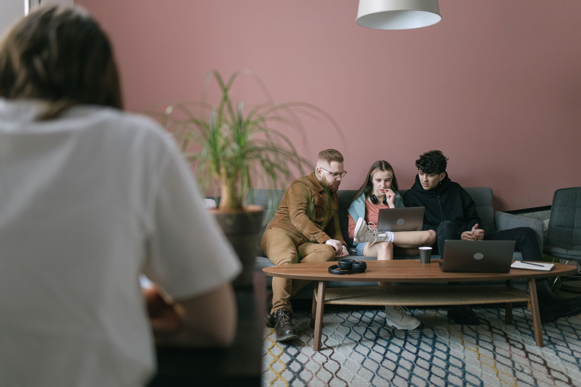 Business professionals in a meeting discussing investment strategy and portfolio decisions
