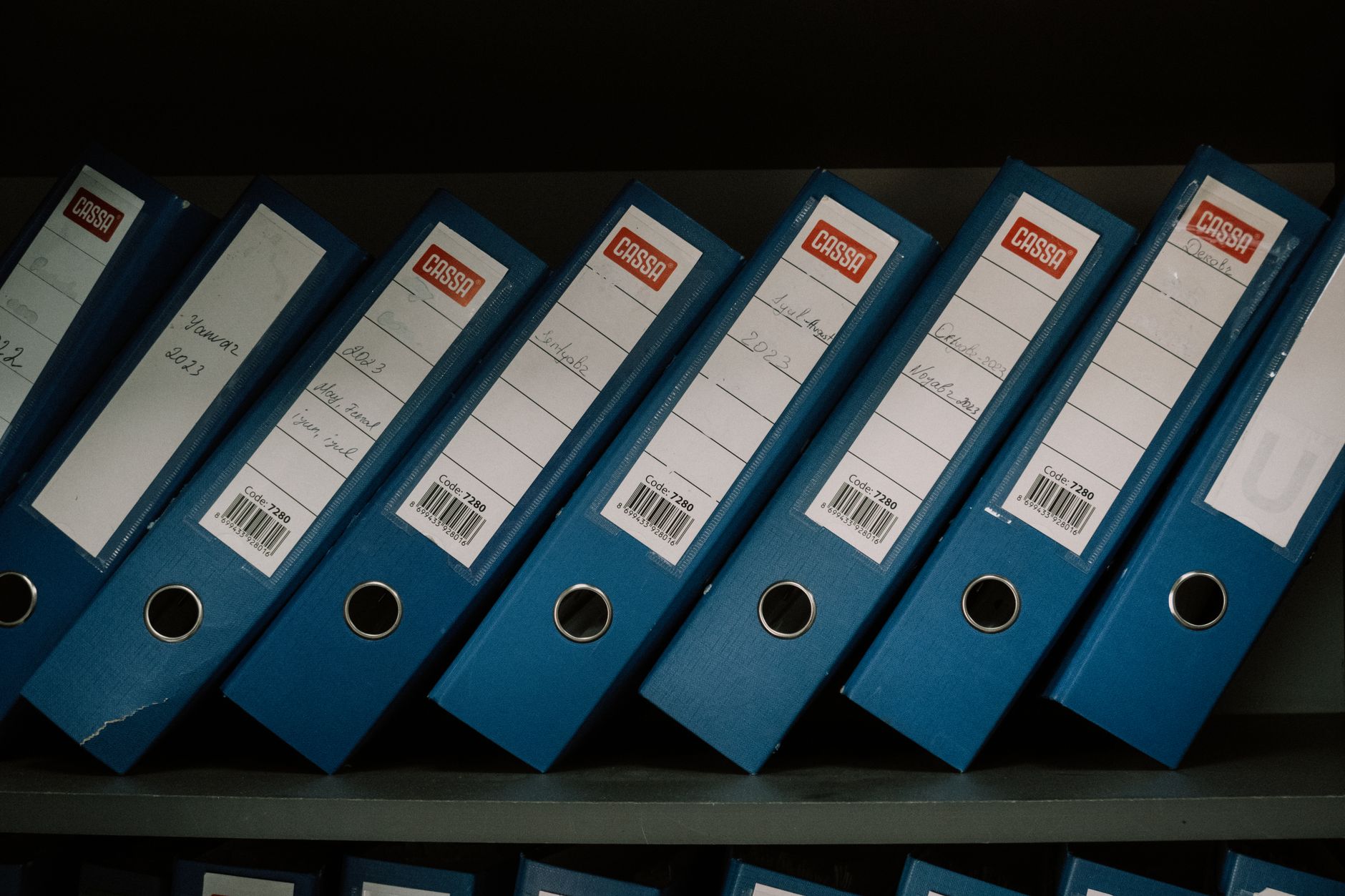 Organized folders and digital file management concept on a desk